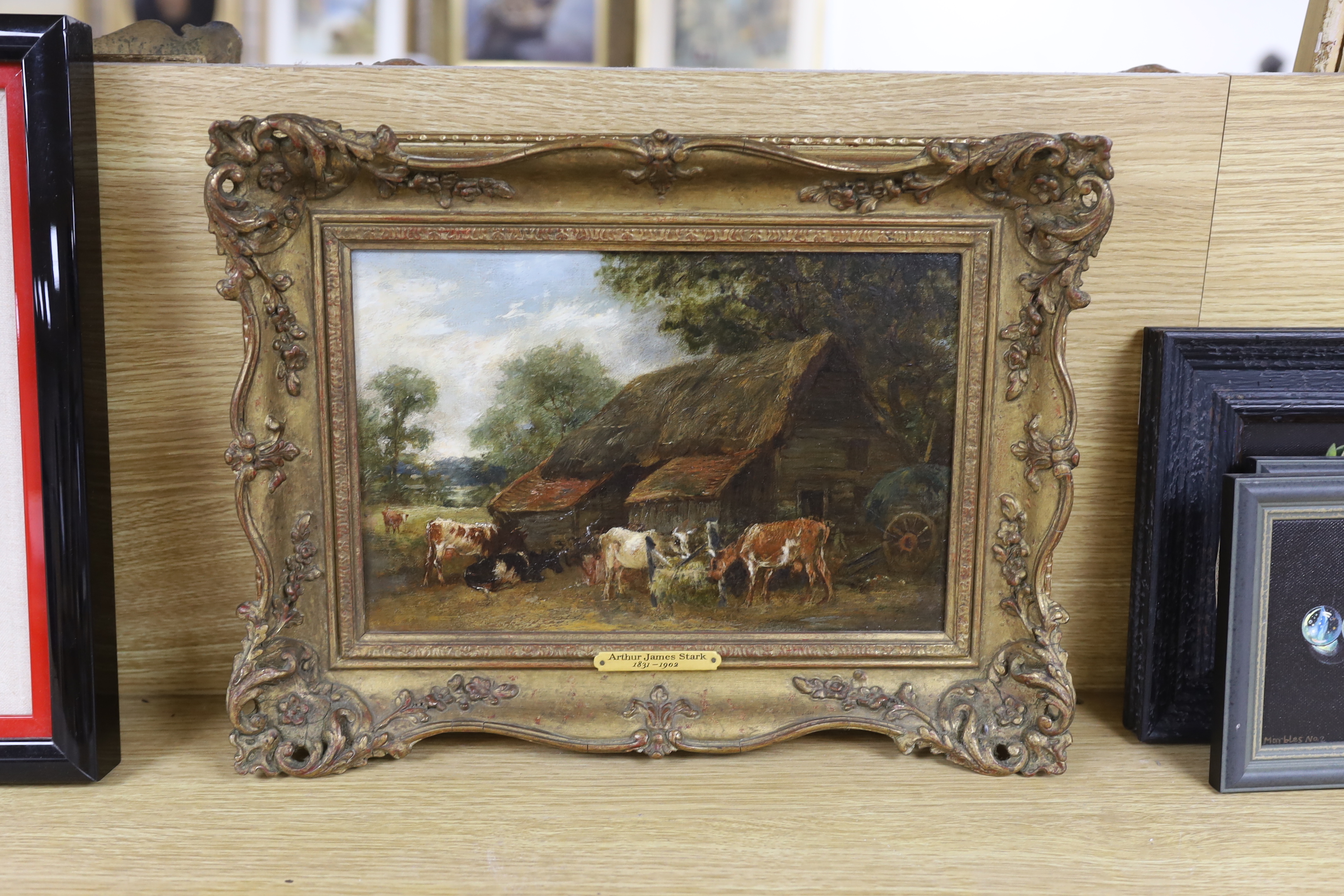 Arthur James Stark (1831-1902), oil on canvas, Farmyard scene with cattle grazing, unsigned, applied plaque to the frame, 19 x 29cm